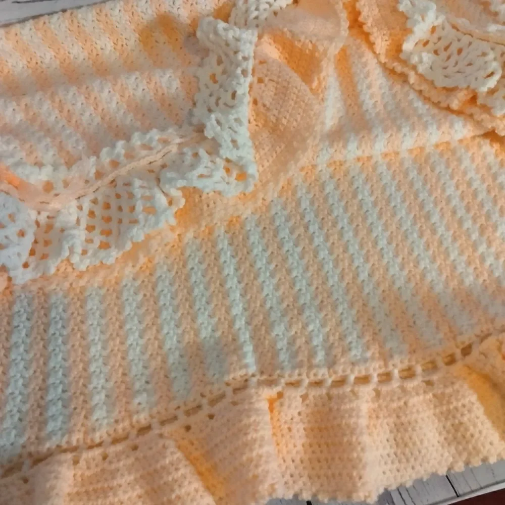 Never used.  ( my mom) homemade baby 🐥 blanket
